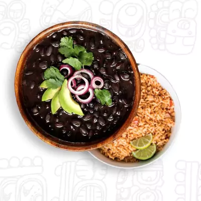 rustic bowl of black beans and organic rise top view