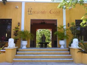 front of the Hacienda Hotel at Coba