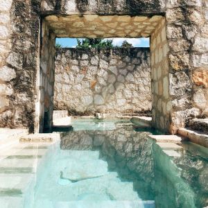 clear water in pool inside the hotel at Coba