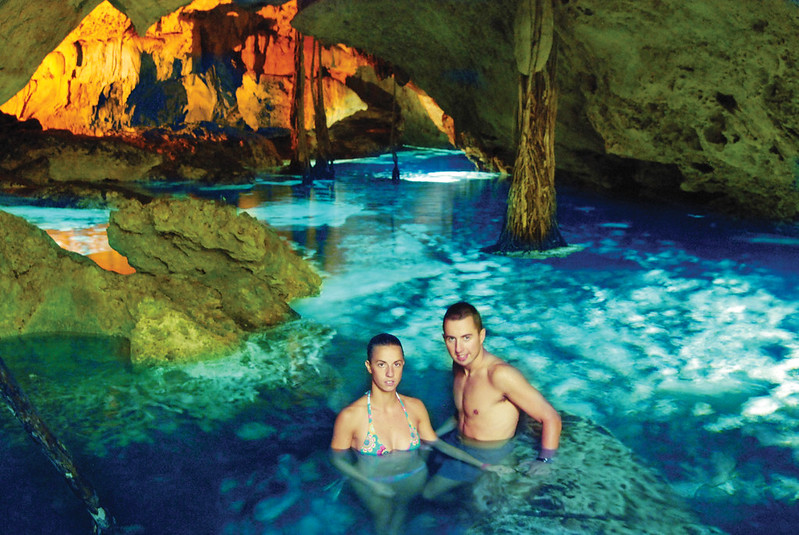 young couple in underground cenote