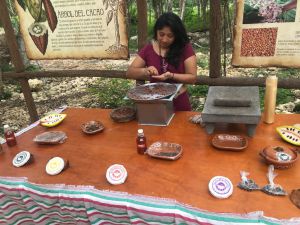 mayan women toasting cacao grains