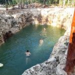 people swiming in Kooleb Cab cenote