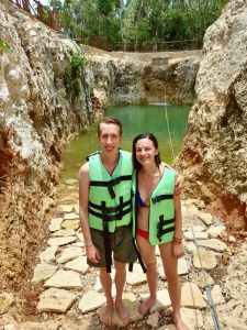 young couple tourist in the Koleeb cab cenote